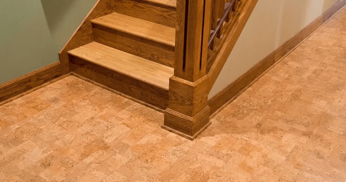 End of a staircase with cork flooring in Manchester, NH