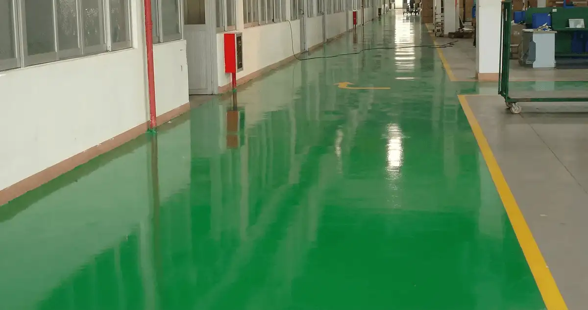 A factory floor professionally covered and marked with epoxy flooring in Manchester, NH