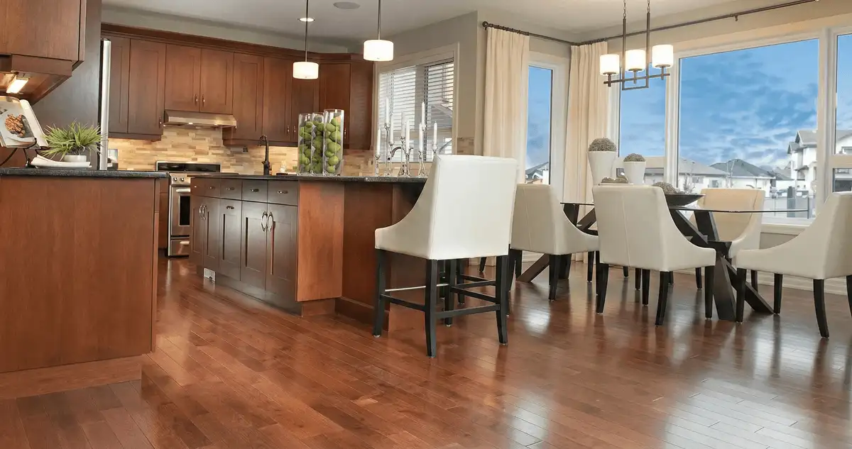 A modern kitchen with professionally installed wood flooring in Manchester, NH