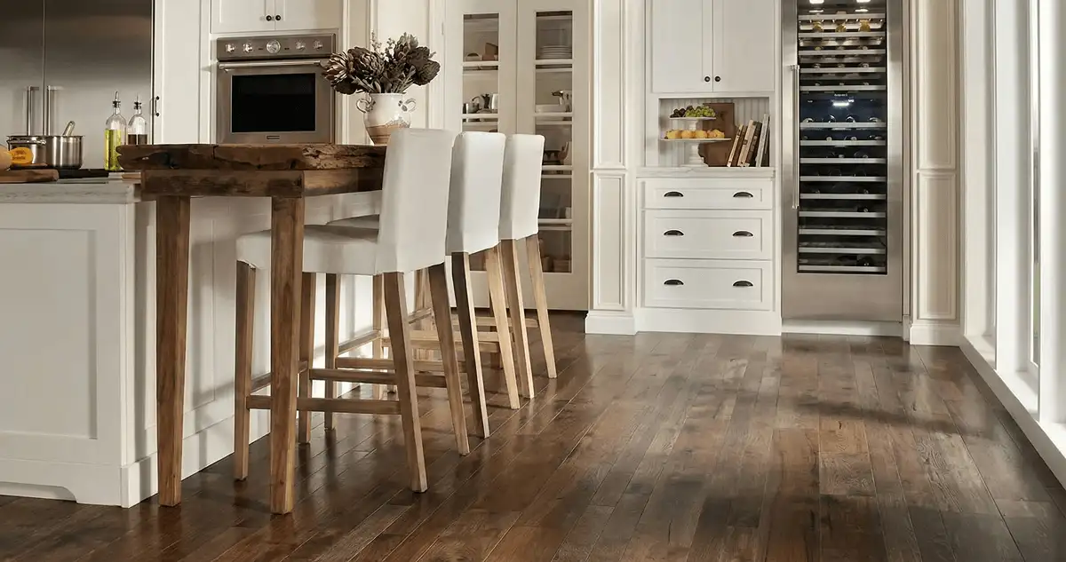 Professionally installed and refinished hardwood flooring in a residential home, showcasing smooth finish and natural wood tones in Manchester, NH
