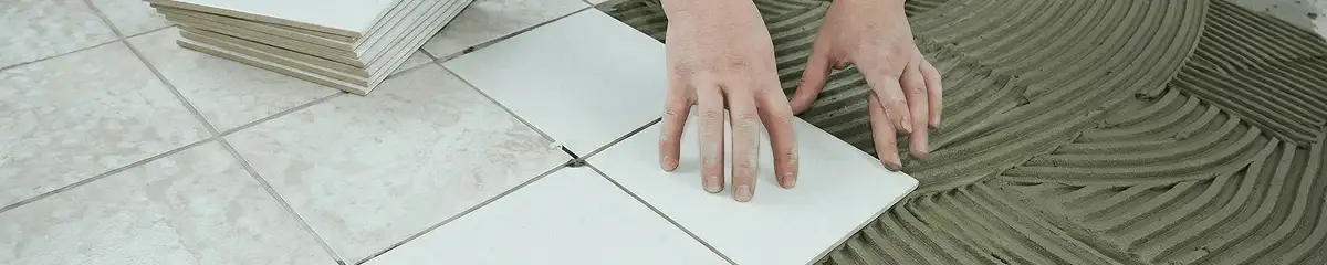 Professional installing white tile floors in Manchester, NH