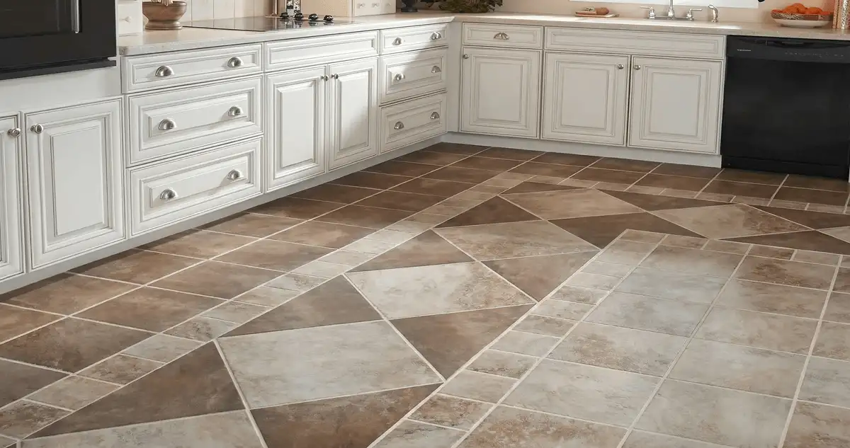 Kitchen with white cabinets and a professionally installed tile floor in Manchester, NH
